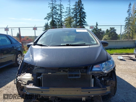2015 Honda Fit LX with VIN 3HGGK5H58FM765907, listed as a IAAI auction lot 42061158 with 120,178 mi miles. Bid and sale history available at carsss.com. Image 13.