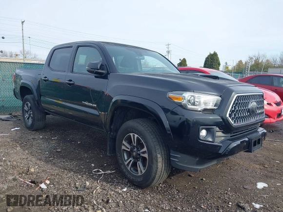 2018 Toyota Tacoma SR5 with VIN 3TMAZ5CN6JM055632, listed as a IAAI auction lot 40751593 with 125,663 mi miles and . Bid and sale history available at DreamBid. Image 1.