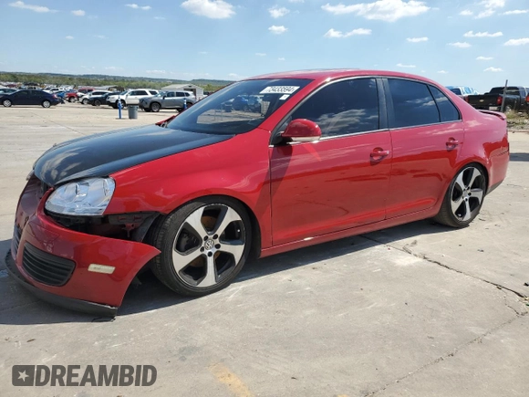 2010 Volkswagen Jetta Wolfsburg Edition with VIN 3VWRJ7AJ6AM069257, listed as a Copart auction lot 73433594 with 184,190 mi miles and Salvage title. Bid and sale history available at DreamBid. Image 1.