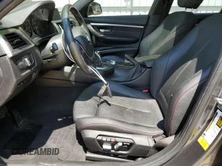 2018 BMW 3 Series 330i with VIN WBA8B9G55JNU99642, listed as a Copart auction lot 53822805 with 142,833 mi miles and Salvage title. Bid and sale history available at DreamBid. Image 7.