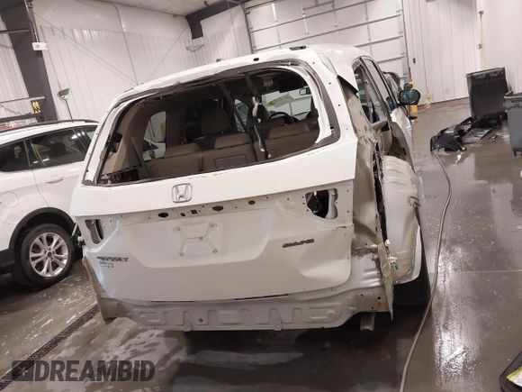 2015 Honda Odyssey Touring Elite with VIN 5FNRL5H92FB020159, listed as a IAAI auction lot 42103240 with 79,322 mi miles and . Bid and sale history available at DreamBid. Image 17.