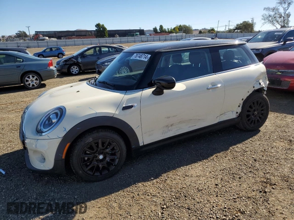 2021 MINI Hardtop Cooper with VIN WMWXR3C07M2N96541, listed as a Copart auction lot 78748714 with 28,706 mi miles and Salvage title. Bid and sale history available at DreamBid. Image 1.