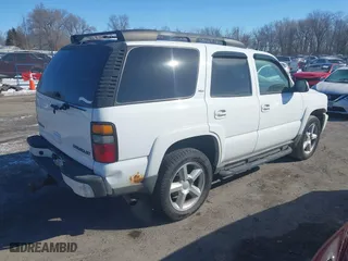 2005 Chevrolet Tahoe Z71 with VIN 1GNEK13T75R102269, listed as a IAAI auction lot 41633323 with 153,759 mi miles. Bid and sale history available at carsss.com. Image 4.