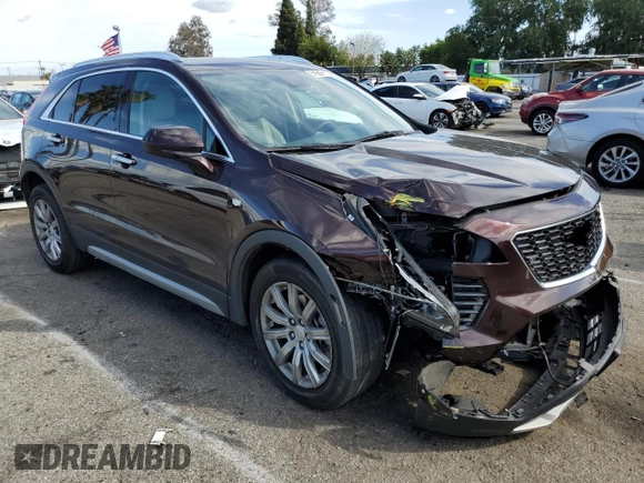 2020 Cadillac XT4 FWD Premium Luxury with VIN 1GYFZCR46LF112188, listed as a Copart auction lot 51536115 with 31,427 mi miles and Salvage title. Bid and sale history available at DreamBid. Image 4.