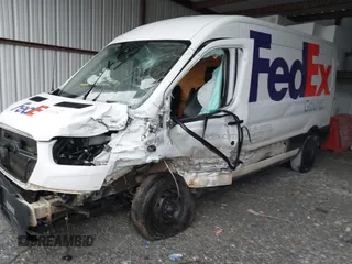 2020 Ford Transit Cargo z VIN 1FTBR1C83LKB20325, wystawiony jako IAAI lot #42316284 z przebiegiem 248 734 mil mil oraz . Historia ofert i sprzedaży dostępna na DreamBid. Obrazek 2.