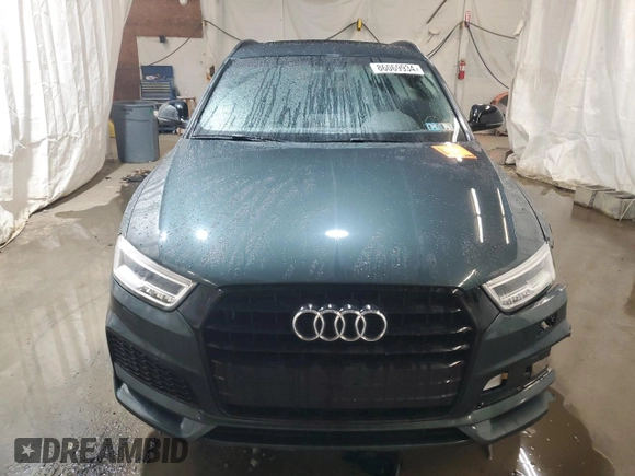 2018 Audi Q3 Premium Plus with VIN WA1JCCFS9JR031065, listed as a Copart auction lot 86069934 with 56,441 mi miles and Salvage Title. Bid and sale history available at carsss.com. Image 5.