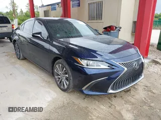 2021 Lexus ES with VIN 58ADZ1B1XMU100242, listed as a IAAI auction lot 41971747 with 27,965 mi miles. Bid and sale history available at carsss.com. Image 1.
