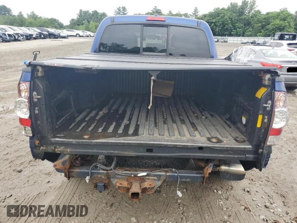 2015 Toyota Tacoma with VIN 3TMLU4EN6FM182144, listed as a Copart auction lot 64000365 with 185,361 mi miles and Clean title. Bid and sale history available at DreamBid. Image 6.