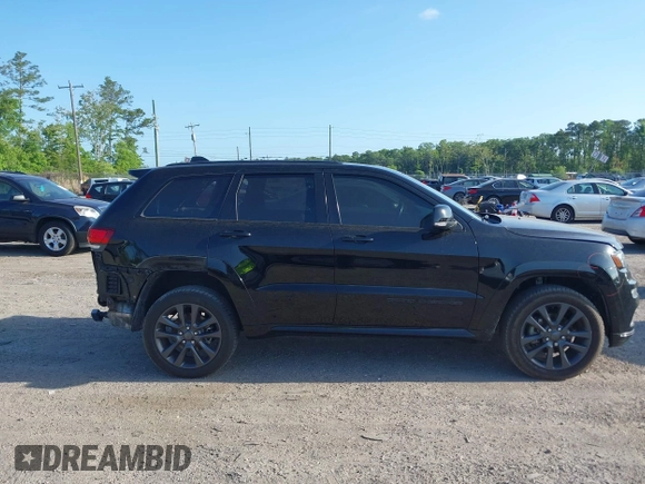 2018 Jeep Grand Cherokee Overland z VIN 1C4RJFCG9JC236856, wystawiony jako IAAI lot #42117905 z przebiegiem 109 330 mil mil oraz . Historia ofert i sprzedaży dostępna na DreamBid. Obrazek 13.