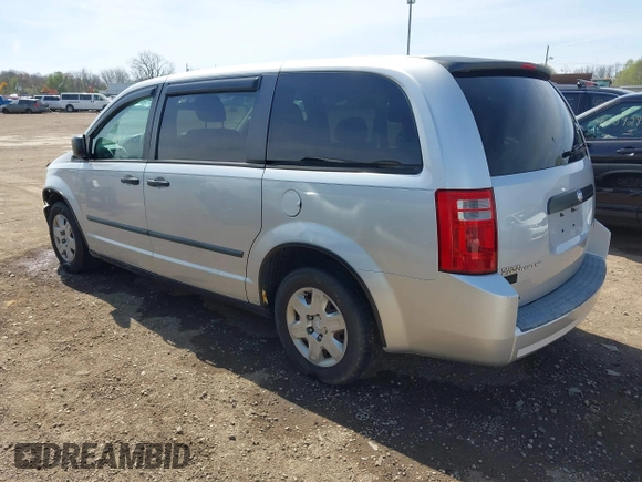 2008 Dodge Grand Caravan SE with VIN 2D8HN44H58R797943, listed as a IAAI auction lot 42073540 with 161,596 mi miles and . Bid and sale history available at DreamBid. Image 3.