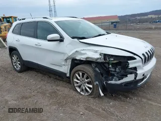 2014 Jeep Cherokee Limited with VIN 1C4PJMDB0EW266749, listed as a IAAI auction lot 41900978 with 82,677 mi miles. Bid and sale history available at carsss.com. Image 1.