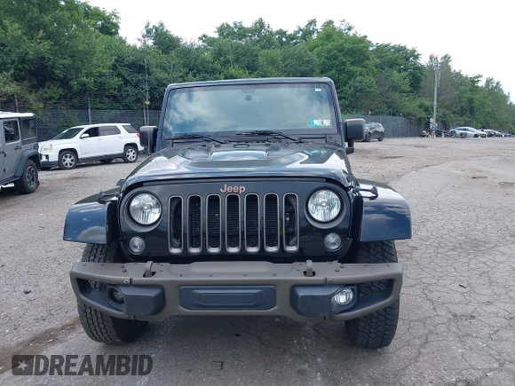 2016 Jeep Wrangler Unlimited Sahara z VIN 1C4HJWEG3GL343340, wystawiony jako IAAI lot #42683859 z przebiegiem 92 878 mil mil oraz . Historia ofert i sprzedaży dostępna na DreamBid. Obrazek 13.