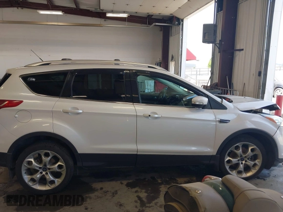 2013 Ford Escape Titanium with VIN 1FMCU9J96DUC60268, listed as a IAAI auction lot 42095407 with 105,307 mi miles and . Bid and sale history available at DreamBid. Image 13.