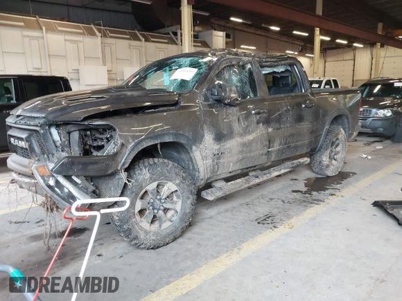 2020 Ram 1500 Rebel with VIN 1C6SRFLT0LN162491, listed as a IAAI auction lot 41841159 with 58,265 mi miles and . Bid and sale history available at DreamBid. Image 2.