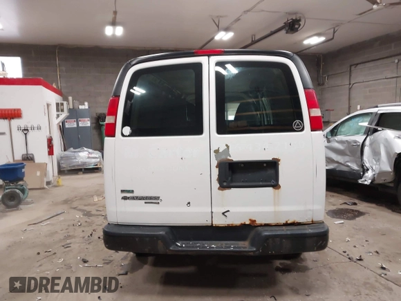 2012 Chevrolet Express Cargo Van with VIN 1GCWGGBA0C1100411, listed as a IAAI auction lot 41024219 with 197,251 mi miles. Bid and sale history available at carsss.com. Image 15.