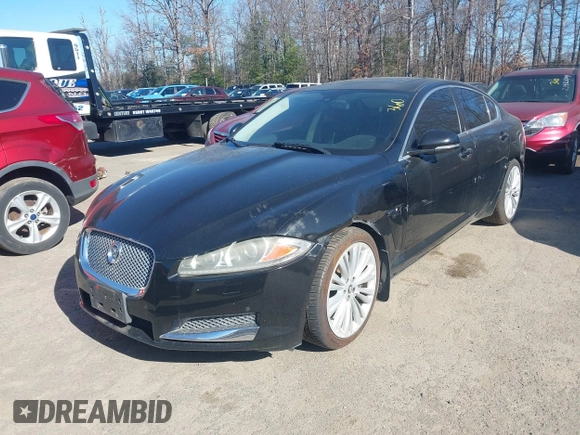 2012 Jaguar XF Portfolio with VIN SAJWA0HB5CLS40694, listed as a IAAI auction lot 41820189 with 1 mi miles. Bid and sale history available at carsss.com. Image 2.