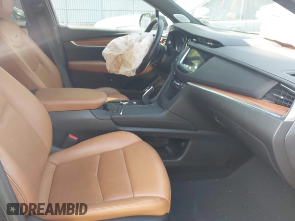 2021 Cadillac XT5 AWD Premium Luxury z VIN 1GYKNDRS8MZ217572, wystawiony jako IAAI lot #42190571 z przebiegiem 25 100 mil mil oraz . Historia ofert i sprzedaży dostępna na DreamBid. Obrazek 5.