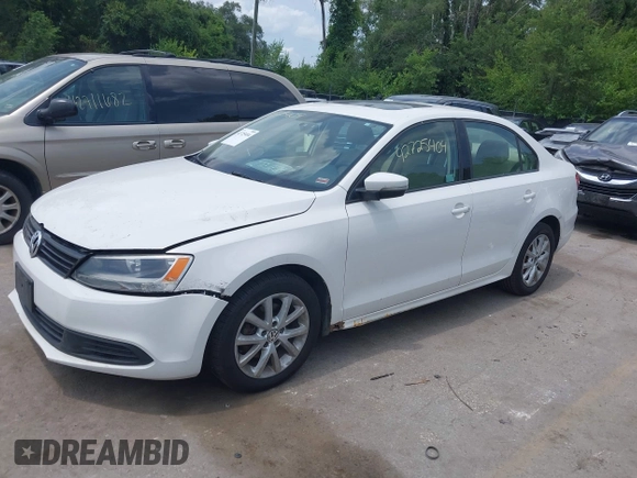 2011 Volkswagen Jetta SE with VIN 3VWDX7AJXBM348012, listed as a IAAI auction lot 42725404 with 235,361 mi miles and . Bid and sale history available at DreamBid. Image 2.