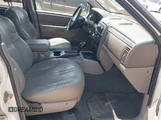 2004 Jeep Grand Cherokee Laredo with VIN 1J4GX48S94C222249, listed as a IAAI auction lot 42598242 with 196,745 mi miles and . Bid and sale history available at DreamBid. Image 5.