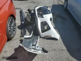 2023 BMW i4 eDrive40 with VIN WBY73AW06PFN86342, listed as a Copart auction lot 57965313 with 5,244 mi miles. Bid and sale history available at carsss.com. Image 12.