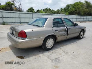 2005 Ford Crown Victoria Standard с VIN 2FAFP73WX5X144927, выставлен на аукционе Copart как лот 59713204 с пробегом 160 270 миль миль и Списание • Salvage title. История ставок и продаж доступна на DreamBid. Изображение 3.