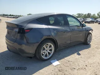 2024 Tesla Model Y Long Range with VIN 7SAYGDEE5RA282984, listed as a Copart auction lot 52388455 with 11,922 mi miles and Salvage Title. Bid and sale history available at DreamBid. Image 3.