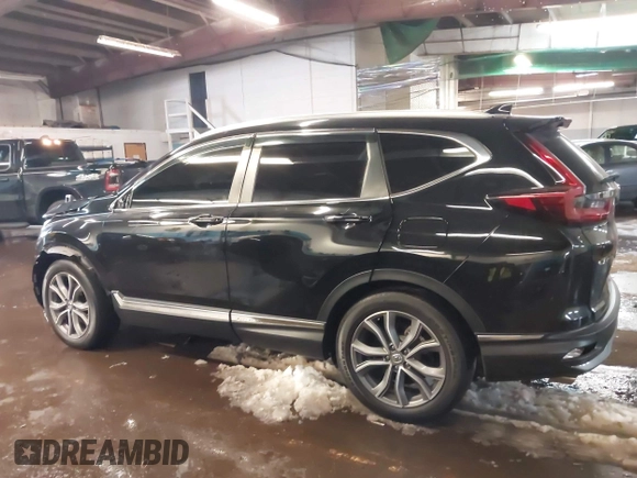 2020 Honda CR-V Touring with VIN 2HKRW2H94LH663650, listed as a IAAI auction lot 41570549 with 29,571 mi miles and . Bid and sale history available at DreamBid. Image 14.