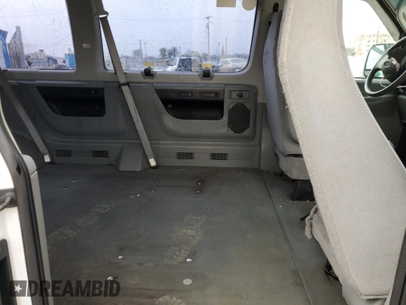 2006 Ford Econoline Passenger XL with VIN 1FMRE11W46DB09883, listed as a Copart auction lot 69028364 with 200,878 mi miles and Salvage Title. Bid and sale history available at DreamBid. Image 12.