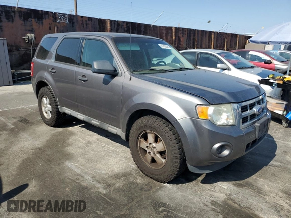 2011 Ford Escape XLS with VIN 1FMCU0C79BKC12943, listed as a Copart auction lot 64702085 with 151,117 mi miles and Clean title. Bid and sale history available at DreamBid. Image 4.