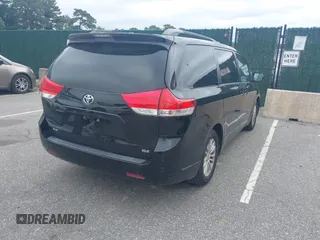 2013 Toyota Sienna XLE AAS with VIN 5TDYK3DCXDS302949, listed as a IAAI auction lot 42611370 with 236,663 mi miles and . Bid and sale history available at DreamBid. Image 4.