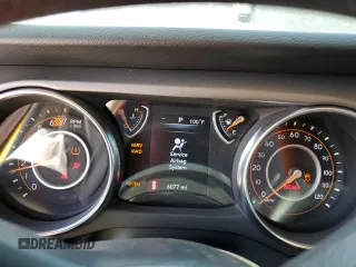 2023 Jeep Wrangler Sport with VIN 1C4HJXAG3PW672856, listed as a Copart auction lot 70444274 with 6,077 mi miles and Salvage title. Bid and sale history available at DreamBid. Image 9.