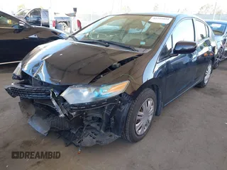 2010 Honda Insight LX with VIN JHMZE2H54AS021815, listed as a IAAI auction lot 42259951 with 137,436 mi miles and . Bid and sale history available at DreamBid. Image 2.