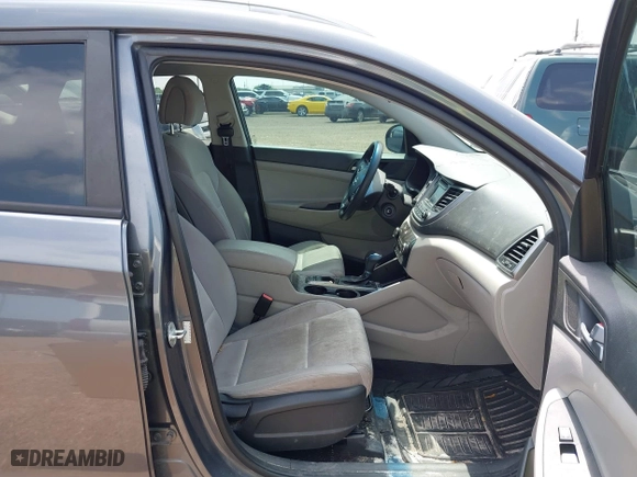 2017 Hyundai Tucson SE Plus with VIN KM8J33A42HU375273, listed as a IAAI auction lot 41900474 with 124,658 mi miles. Bid and sale history available at carsss.com. Image 5.