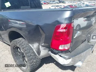 2015 Ram 1500 Big Horn z VIN 1C6RR7GT8FS549293, wystawiony jako IAAI lot #41833000 z przebiegiem Nie podano mil oraz . Historia ofert i sprzedaży dostępna na DreamBid. Obrazek 6.