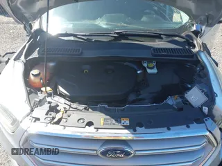 2018 Ford Escape Titanium with VIN 1FMCU9J96JUA33500, listed as a IAAI auction lot 42121736 with 105,430 mi miles and . Bid and sale history available at DreamBid. Image 10.