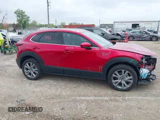 2023 Mazda CX-30 S Premium with VIN 3MVDMBDM3PM511402, listed as a IAAI auction lot 42180001 with 6,189 mi miles and . Bid and sale history available at DreamBid. Image 14.