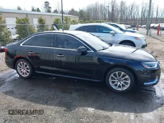 2021 Audi A4 Premium z VIN WAUABAF47MA039793, wystawiony jako IAAI lot #41763169 z przebiegiem 34 191 mil mil oraz . Historia ofert i sprzedaży dostępna na DreamBid. Obrazek 13.
