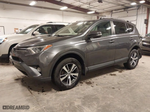 2018 Toyota RAV4 XLE with VIN 2T3RFREV4JW835563, listed as a IAAI auction lot 41431755 with 106,983 mi miles. Bid and sale history available at carsss.com. Image 2.