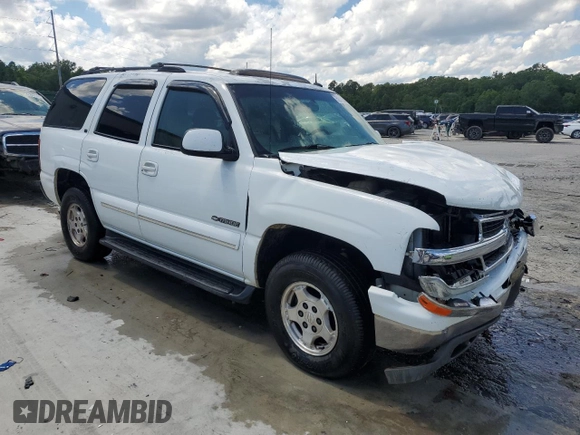 2002 Chevrolet Tahoe LT with VIN 1GNEC13Z92J335338, listed as a Copart auction lot 56715805 with 332,986 mi miles and Salvage title. Bid and sale history available at DreamBid. Image 4.