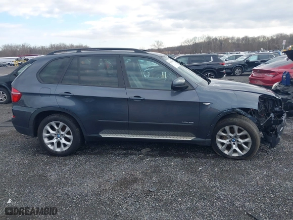 2011 BMW X5 35i with VIN 5UXZV4C59BL415034, listed as a IAAI auction lot 40969149 with 108,468 mi miles. Bid and sale history available at carsss.com. Image 13.