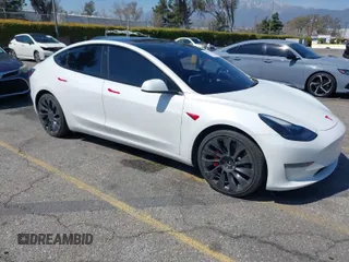 2022 Tesla Model 3 Performance with VIN 5YJ3E1EC2NF176127, listed as a IAAI auction lot 41807613 with 79,435 mi miles. Bid and sale history available at carsss.com. Image 1.