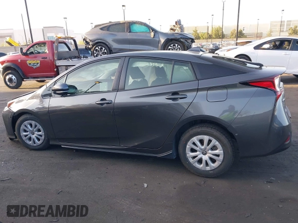 2020 Toyota Prius L Eco z VIN JTDKARFU9L3122010, wystawiony jako IAAI lot #41969655 z przebiegiem 76 250 mil mil oraz . Historia ofert i sprzedaży dostępna na DreamBid. Obrazek 14.