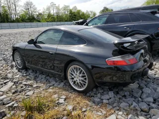 1999 Porsche 911 z VIN WP0AA2990XS626600, wystawiony jako Copart lot #56749505 z przebiegiem 82 979 mil mil oraz Szkody całkowita. Historia ofert i sprzedaży dostępna na DreamBid. Obrazek 2.