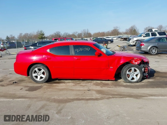 2010 Dodge Charger SXT with VIN 2B3CA3CV0AH197611, listed as a IAAI auction lot 41764997 with 211,670 mi miles and . Bid and sale history available at DreamBid. Image 14.