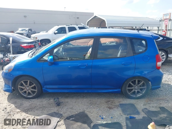 2007 Honda Fit Sport with VIN JHMGD386X7S029838, listed as a IAAI auction lot 41942513 with 141,612 mi miles. Bid and sale history available at carsss.com. Image 14.