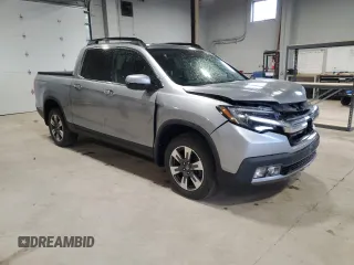 2019 Honda Ridgeline RTL-E with VIN 5FPYK3F74KB502413, listed as a Copart auction lot 55154935 with 71,711 mi miles and Salvage title. Bid and sale history available at DreamBid. Image 4.