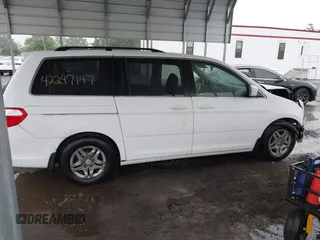 2007 Honda Odyssey EX-L z VIN 5FNRL38717B400727, wystawiony jako IAAI lot #42247147 z przebiegiem 199 430 mil mil oraz . Historia ofert i sprzedaży dostępna na DreamBid. Obrazek 13.