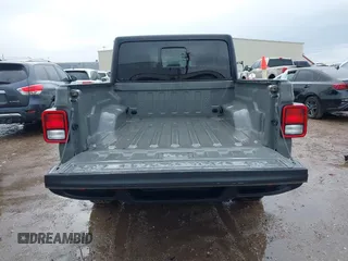 2023 Jeep Gladiator Sport S z VIN 1C6HJTAG3PL523140, wystawiony jako IAAI lot #41719004 z przebiegiem 34 014 mil mil oraz . Historia ofert i sprzedaży dostępna na DreamBid. Obrazek 13.