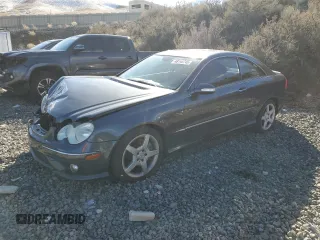 2009 Mercedes-Benz CLK 3.5L with VIN WDBTJ56H39F269364, listed as a Copart auction lot 48144745 with 99,139 mi miles and Salvage Title. Bid and sale history available at carsss.com. Image 1.