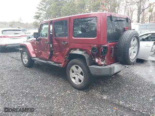 2012 Jeep Wrangler Unlimited Sahara with VIN 1C4HJWEG5CL107931, listed as a IAAI auction lot 41672485 with NaN miles. Bid and sale history available at carsss.com. Image 3.